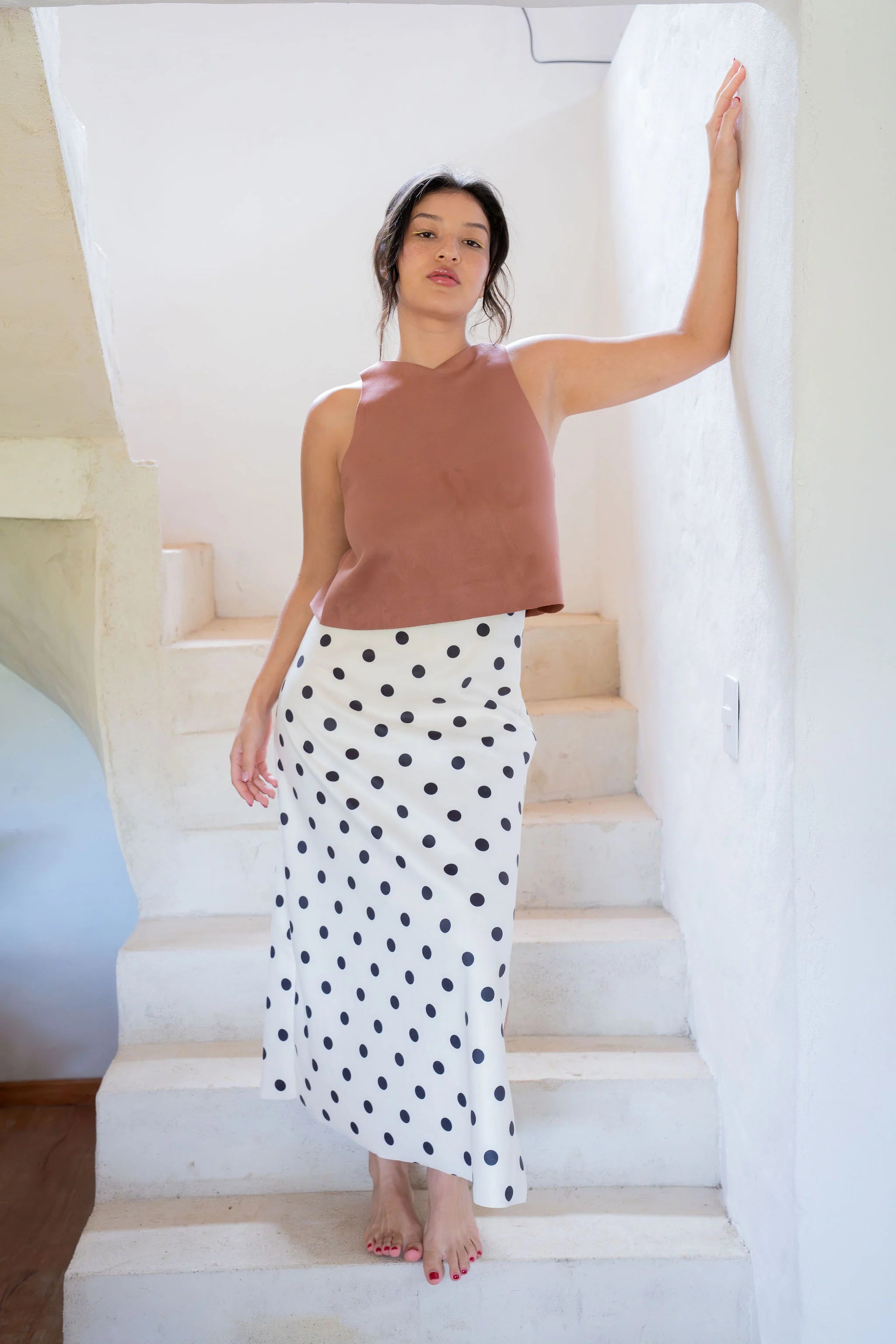 TOP CLEO CANELA